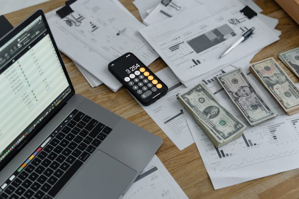 banknotes and calculator on the table